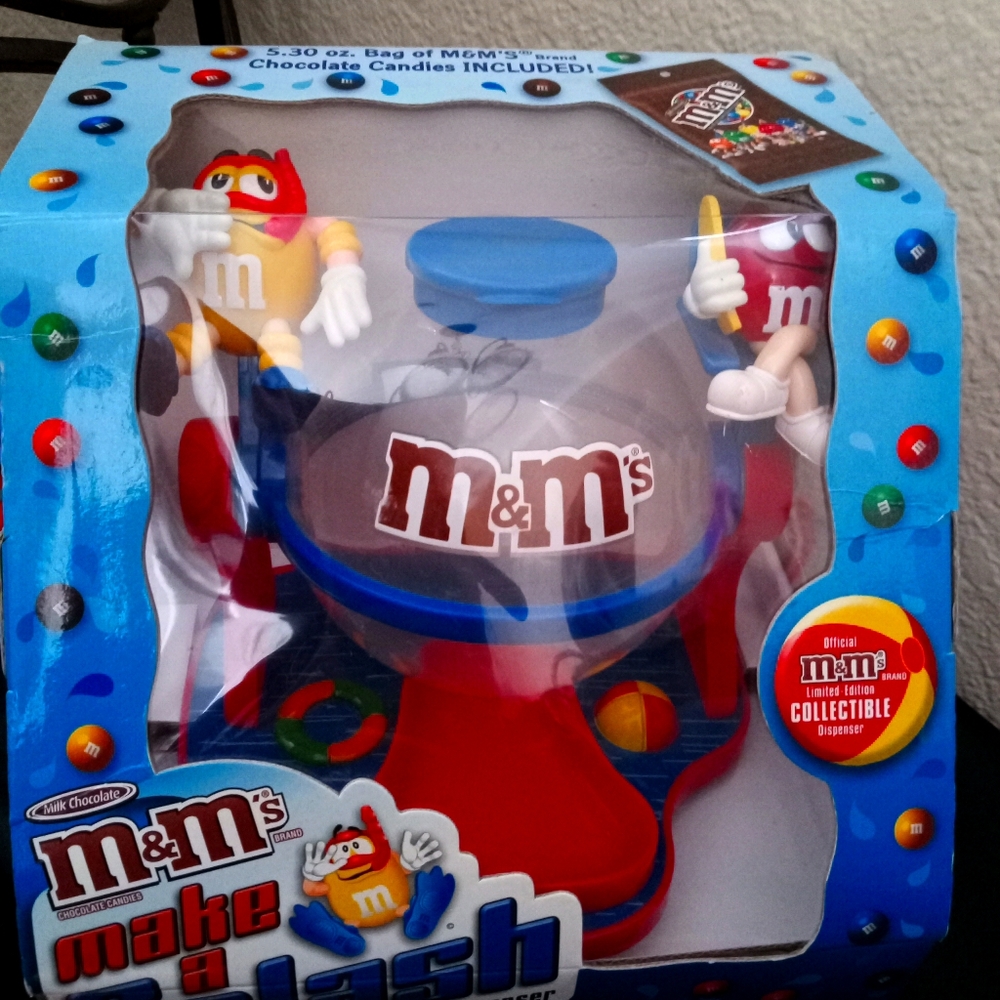 Collectible M&M candy dispenser. Offers consider